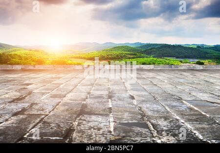 Unmanned blue brick pavement and peaceful mountain village natural landscape. Stock Photo