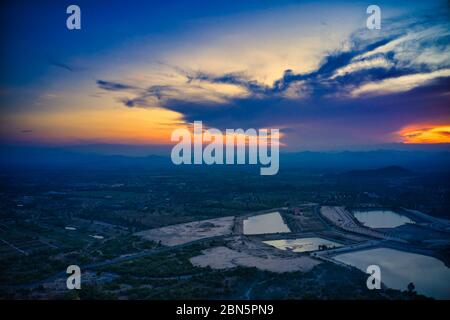 This unique photo shows the hilly landscape with lakes, from hua Hin in thailand, taken with a drone during a fantastic sunset! Stock Photo
