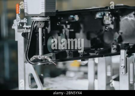 Close up of 3D dimension measurement plastic parts by CMM, 3D automatic measuring system Stock Photo