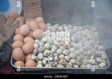 Eggs for sale in Hong Kong: Quail eggs  and chicken eggs Stock Photo