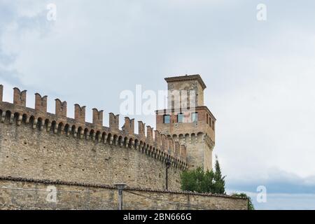 Vigoleno,Italy- July 22, 2018:View of the city walls of Vigoleno, one of the most beautiful villages in Italy during a cloudy day. Stock Photo