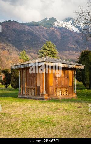 An old wooden hut cabin lodge in Kashmir Himalayas rural landscape Stock Photo