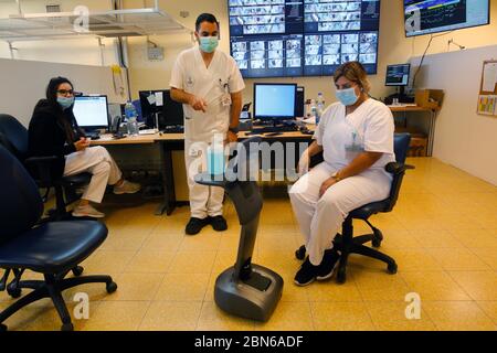 Tel Aviv, Israel. 12th May, 2020. Israeli medical workers test a Temi robot at Sheba Medical Center near Tel Aviv, Israel, on May 12, 2020. Temi robot, developed by an Israeli company, is being used in hospitals and medical centers to help minimize human-to-human contact amid the COVID-19 outbreak. Credit: Gil Cohen Magen/Xinhua/Alamy Live News Stock Photo