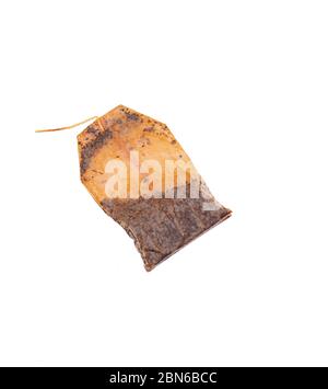 Used tea bag, dirty teabag with string, isolated on white background, tip view Stock Photo