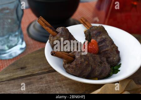 Kofta on cinnamon stick. Fresh Food Buffet Brunch Catering Dining Eating Party Sharing Concept Stock Photo