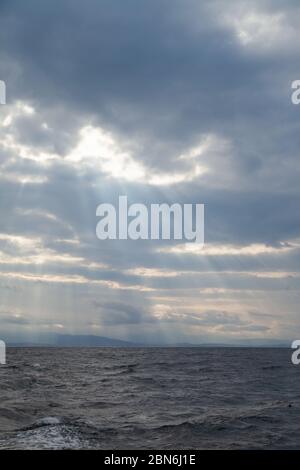 Dramatic looking skies seen heading to Rum from Mallaig on a Cal Mac ferry Stock Photo