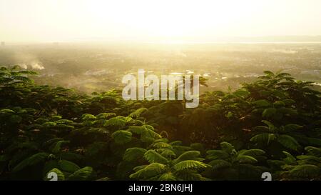 View to Mandalay from Buddhist temple at sunset, Myanmar Stock Photo