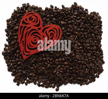 Coffee beans lying on white isolated background Stock Photo