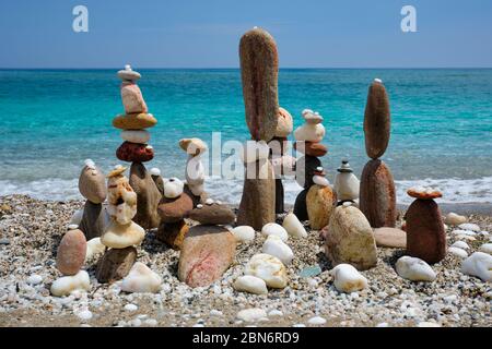 Concept of balance and harmony - pebble stone stacks on the beach Stock Photo