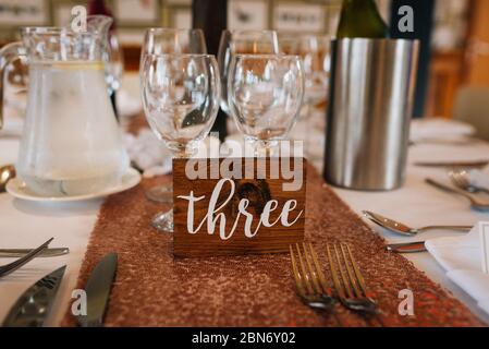 a table set up at an english wedding ready for the wedding breakfast meal. wedding reception Stock Photo