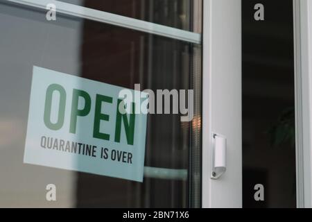 Sign that says OPEN on cafe or restaurant Stock Photo