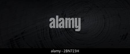 Panoramic black cut wood texture and rough organic tree rings with close up Stock Photo