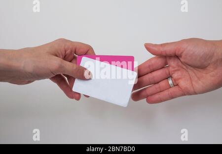 Business people exchanging cards images Stock Photo