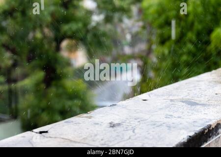 Rain droplets on wall Stock Photo