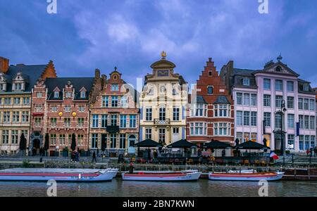 Picturesque medieval buildings overlooking the Graslei harbor on Leie river in Ghent town, Belgium, Europe. Stock Photo