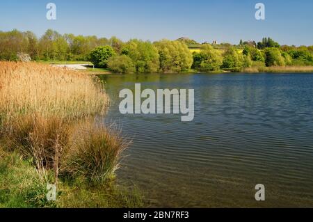 UK,West Yorkshire,Wakefield,Pugney's Country Park with Sandal Castle in the distance Stock Photo