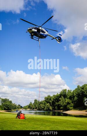 Duesseldorf, North Rhine-Westphalia, Germany - Helicopter Airbus H145 of the police flying squadron during an exercise with the new 820 liter fire-fig Stock Photo