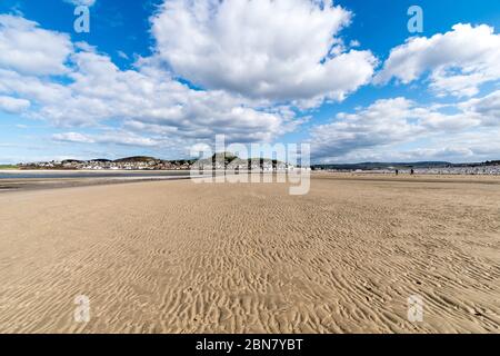 Conwy Morfa beach on the North Wales coast looking towards Deganwy Stock Photo