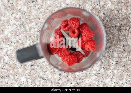 Download A Closeup Photo Of Delicious Raspberries In Plastic Container Stock Photo Alamy PSD Mockup Templates