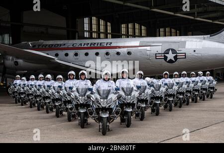 Berlin, Germany. 13th May, 2020. Cops ride new motorcycles. The handover took place at the former Tempelhof Airport. Credit: Paul Zinken/dpa/Alamy Live News Stock Photo