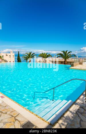 Infinity pool at a hotel resort in Corfu, Greece. Stock Photo