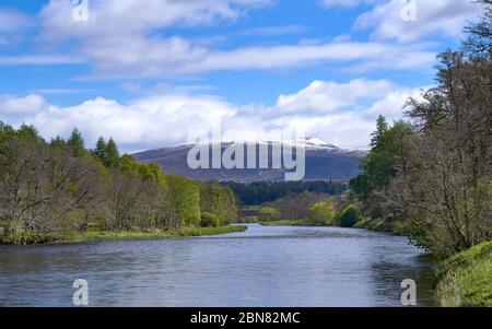 SPEYSIDE WAY RIVER SPEY SCOTLAND VIEW DOWN THE RIVER TO SNOW COVERED BEN RINNES EARLY SPRING