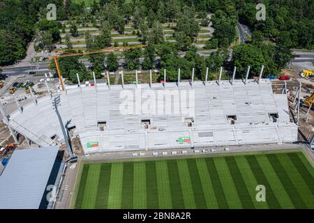 The versus straight is currently being built. The beams and souls on the long side are assembled. Drone shot of construction site at Wildparkstadion Karlsruhe. GES / Football / 2nd Bundesliga Karlsruher SC Wildpark Stadium, May 12, 2020 Football / Soccer: 2nd German Bundesliga: Karlsruher SC Stadium, Karlsruhe, May 12, 2020 Drone view over KSC-Wildpark Stadium under construction. | usage worldwide Stock Photo