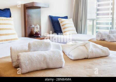 Modern bedroom with large glass windows. European hotel design. Close-up. Stock Photo