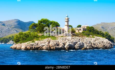 Lighthouse on island in summersunny day, Mallorca, Balearic island, Spain Stock Photo