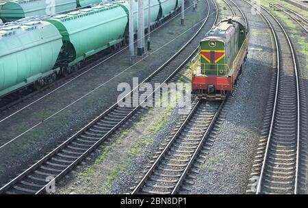 Odessa, Ukraine. July 22th 2018. Shunting locomotive standing on rails at the train station. Front view from the top. The railway station on which Stock Photo