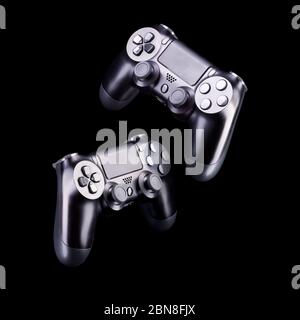Set of black video game joysticks gamepad isolated on a white ...