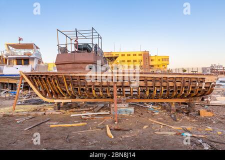 Wooden framework of old boat under construction at shipyard in Hurghada Egypt Stock Photo