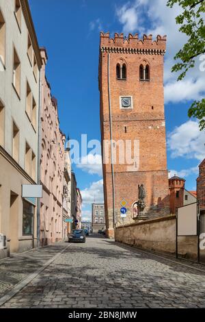 Zabkowice Slaskie, Poland. View of Leaning Tower (Krzywa Wieza) - medieval brick tower with clock Stock Photo