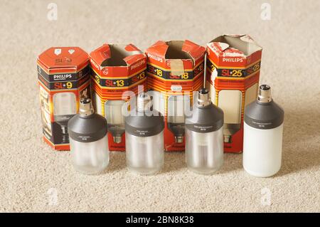 Philips SL compact fluorescent lamps original design from the 1980s in hexagonal boxes retro design Stock Photo