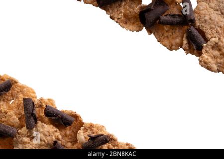 Corn flakes, fresh granola, muesli with chocolate flakes. Tasty homemade granola. Bran cereal with chocolate curls. Sweet corn. Vegetarian healthy org Stock Photo