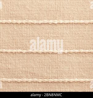 White cotton fabric texture background, pattern of natural textile. Kitchen cotton towel. Dishtowel, checked linen tablecloth. Beige serviette in rest Stock Photo