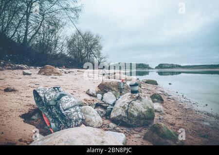 Cooking while hiking with a backpack. Stock Photo