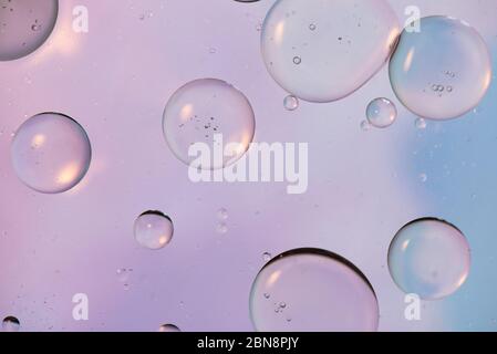 Defocused pastel colored abstract background picture made with oil, water and soap Stock Photo