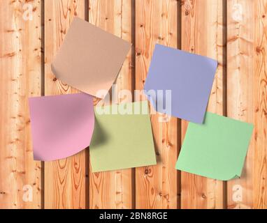Blank sticky notes on wooden panels Stock Photo