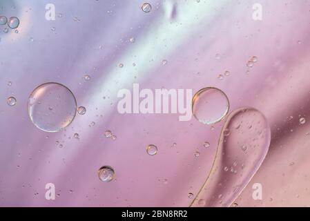 Defocused pastel colored abstract background picture made with oil, water and soap Stock Photo