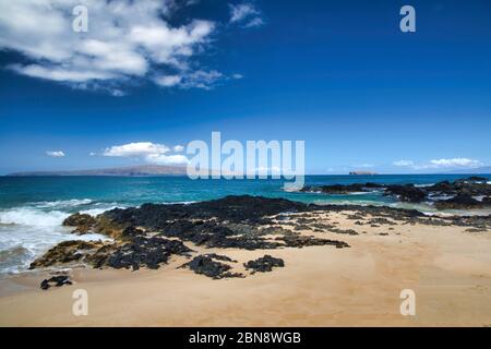 View from  Secret Beach with Kahoolawe and Molokini in the distance. Stock Photo