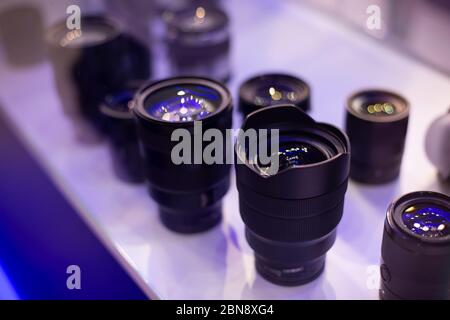 lenses stand vertically in the window. soft focus side view Stock Photo