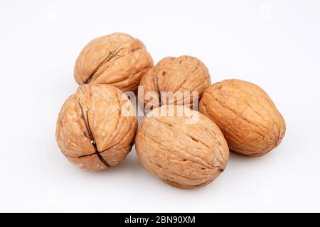 Some Organic walnut on white background. Top view Stock Photo