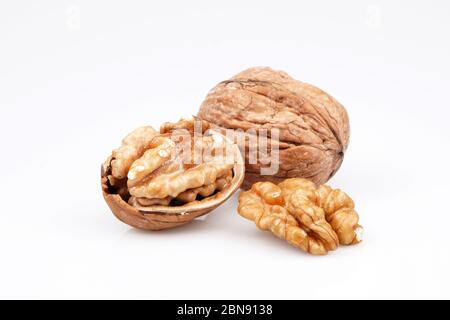 Organic Delicious walnuts, isolated on white background Stock Photo