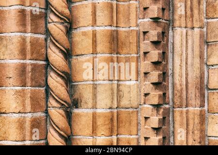 Red brick wall texture background. Pattern of weathered antique brickwall. Stacked stones ornament. Brick work wall from old building architecture. Stock Photo