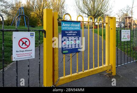London, United Kingdom - April 04, 2020: Area closed sign on fence in Lewisham park due to coronavirus covid-19. Entering many public places is prohib Stock Photo