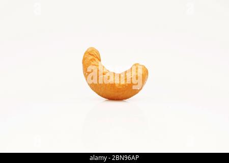 Close up of Roasted organic cashew nut isolated on white background Stock Photo