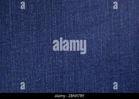 A closeup of a piece of denim fabric. View of the weave. Stock Photo