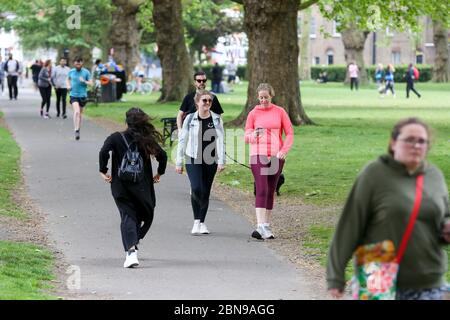 London, UK. 10th May, 2020. People exercising in London Field park, Hackney in north London during the coronavirus lockdown. Credit: Dinendra Haria/SOPA Images/ZUMA Wire/Alamy Live News Stock Photo
