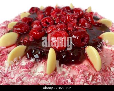Сream berry cake with blueberry, blackberry, brownie isolated on white background. Stock Photo
